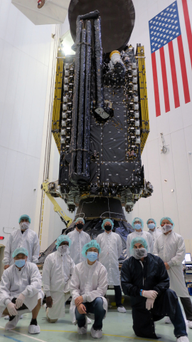 Maxar and SiriusXM employees pose for a photo with Maxar-built SXM-8 ahead of encapsulation in the fairing of SpaceX’s Falcon 9 rocket in Cape Canaveral, Florida. Image credit: Maxar.